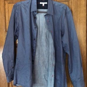 An Issac Mizrahi buttoned up dress shirt